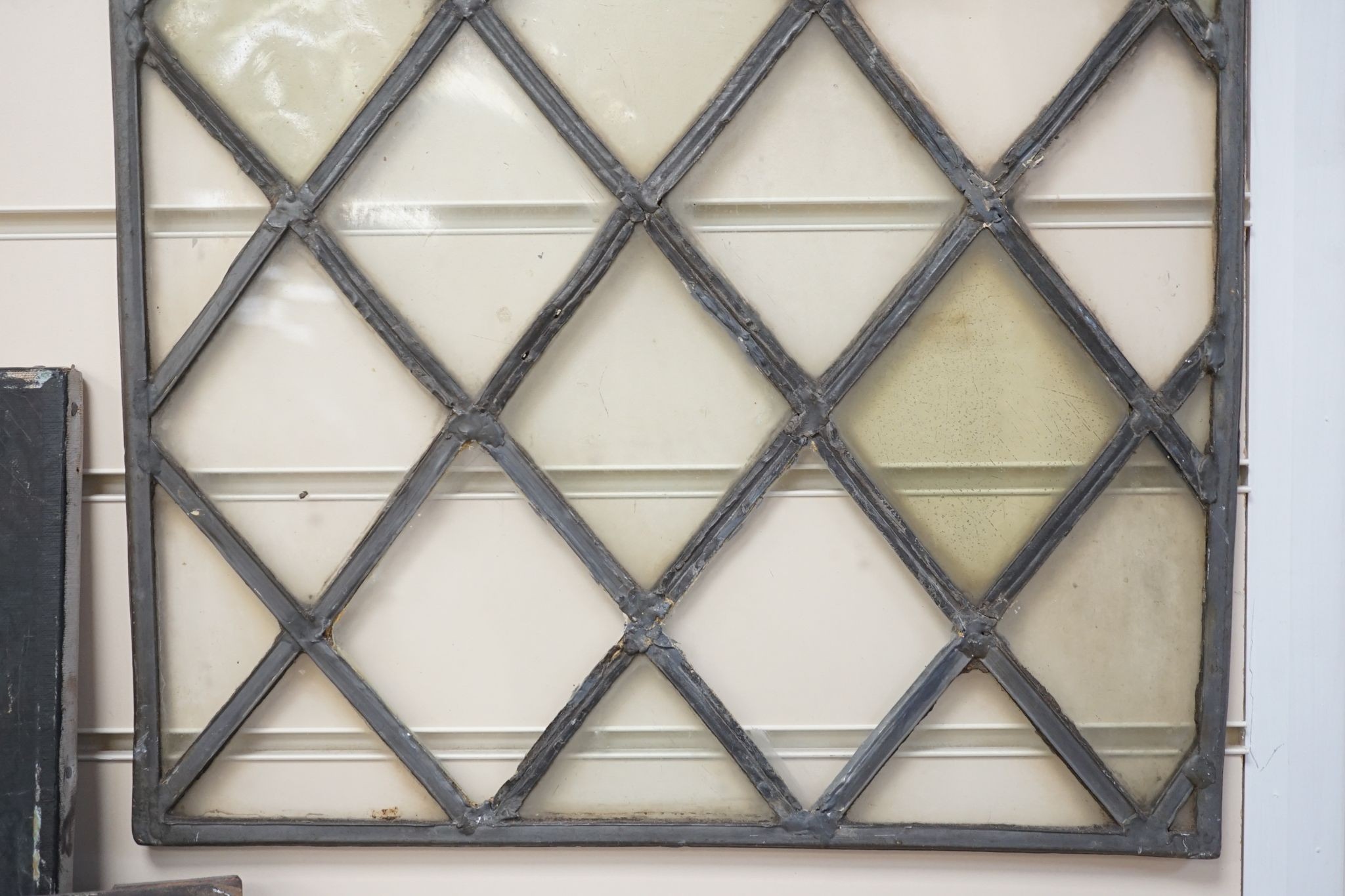 An antique lead and stained glass panel, possibly Elizabethan. 81x42cm